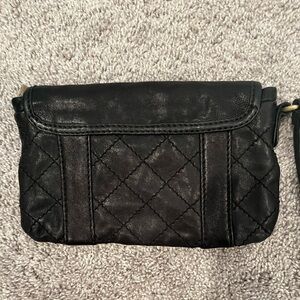 Marc Jacobs black wristlet snap and zip closure. Like new.
